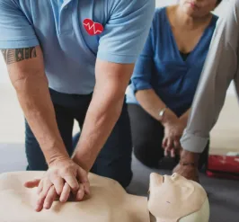 Male instructor leading a CPR class