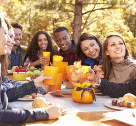 People eating at a table outside